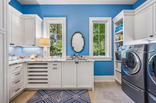 Thoughtfully positioned main-level laundry adds everyday convenience.