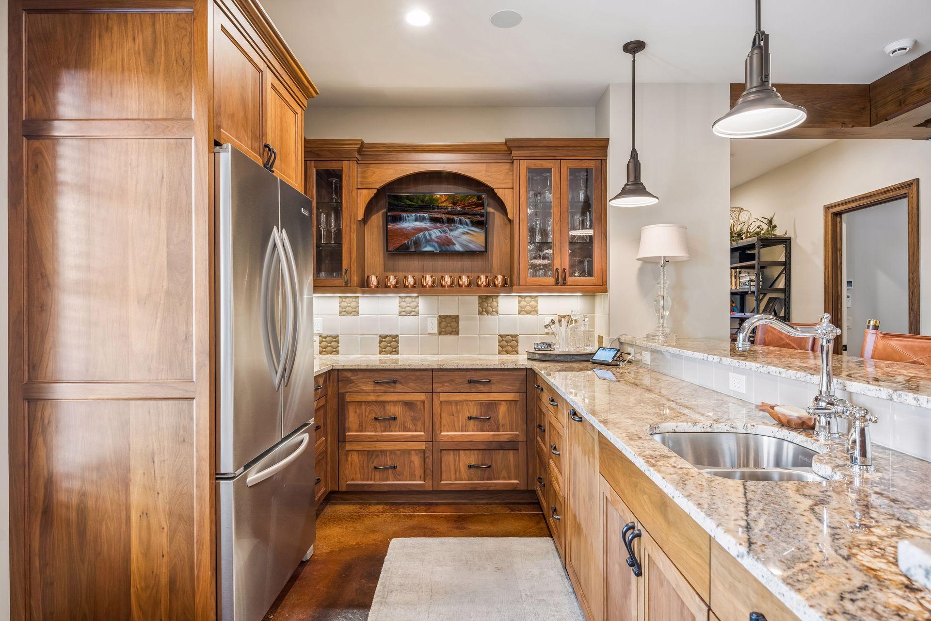 Refrigeration, microwave, and bar seating make hosting effortless.