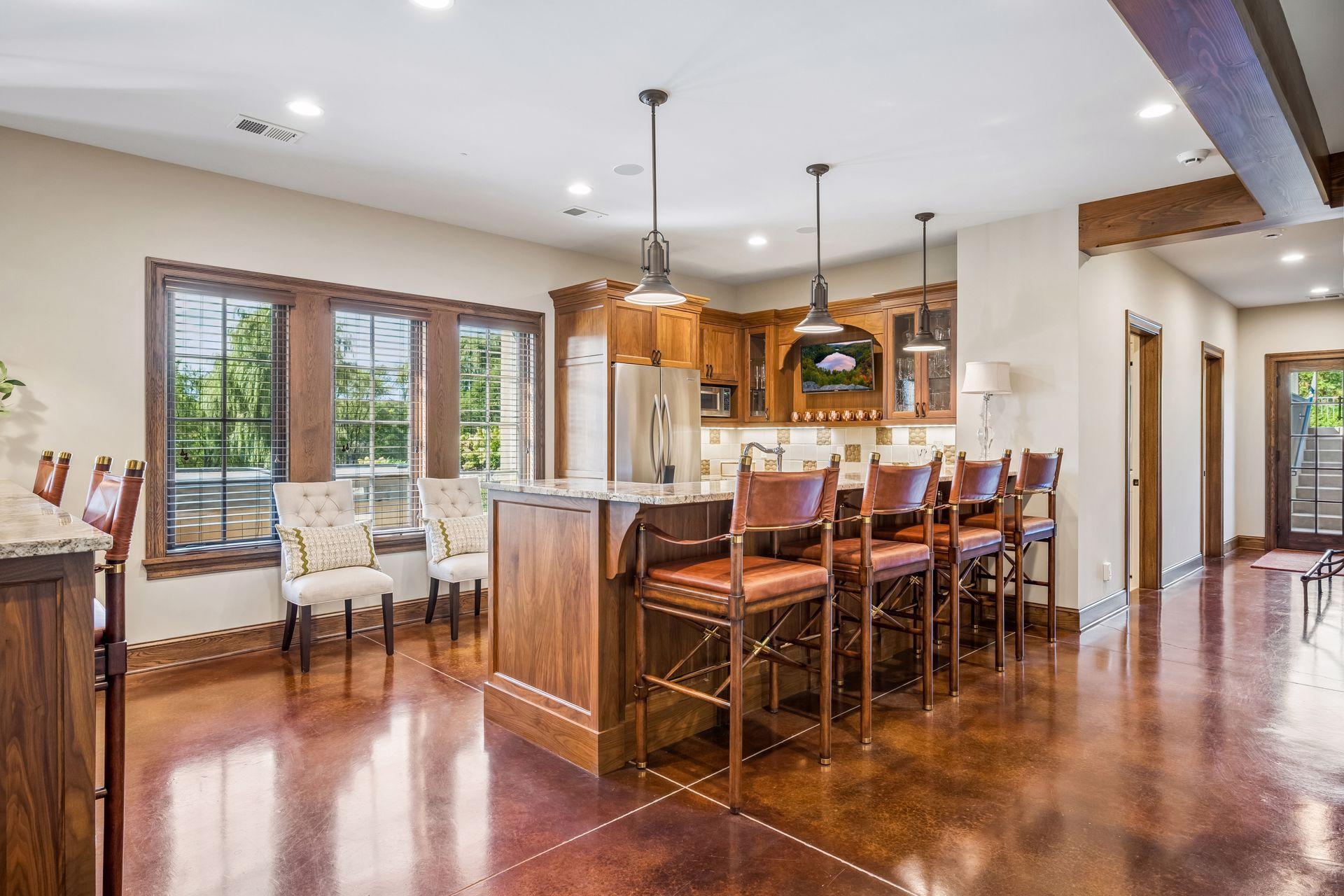 A second kitchen and wet bar create an exceptional entertaining destination.