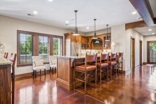 A second kitchen and wet bar create an exceptional entertaining destination.