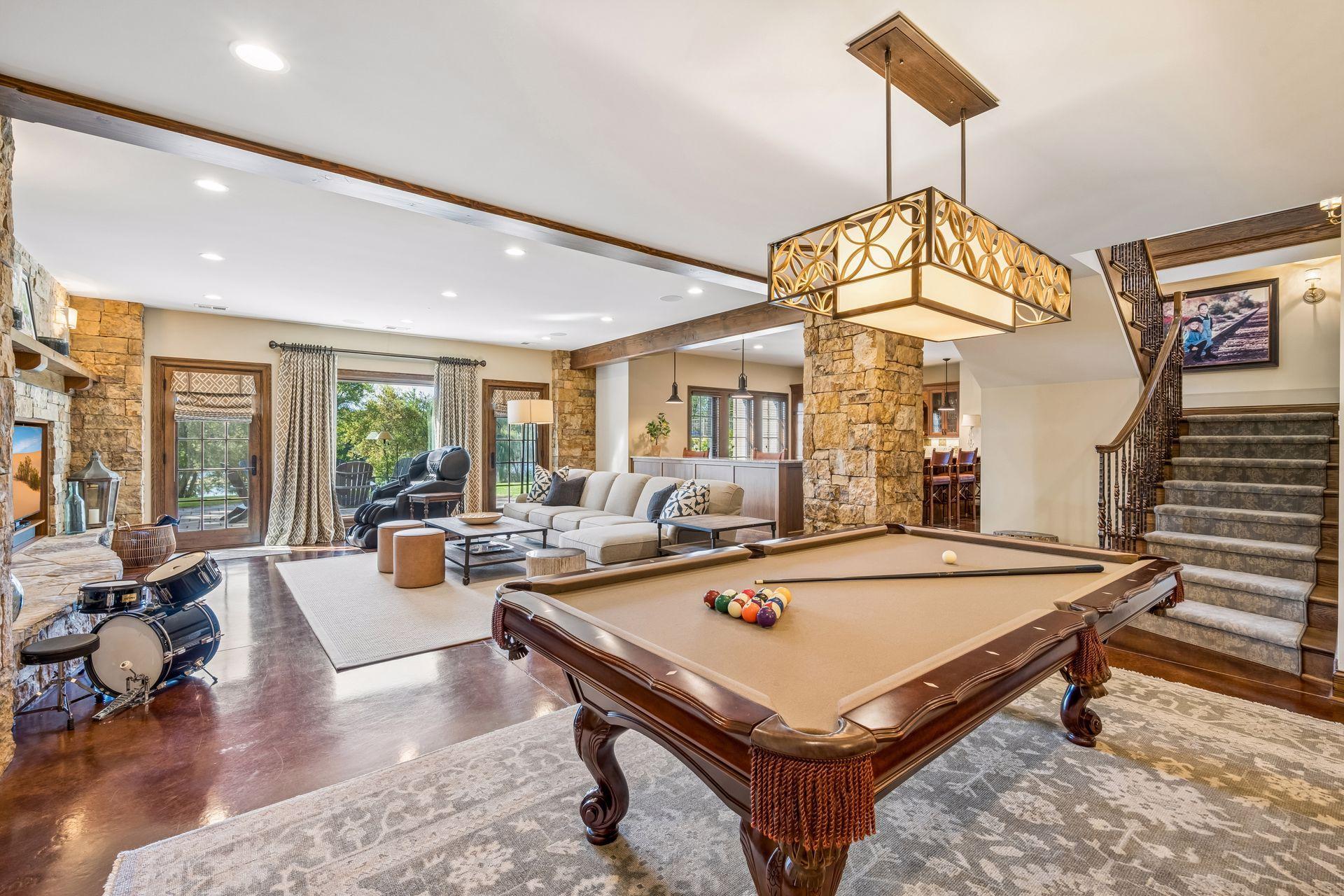 The billiards area offers plenty of room for recreation and gathering.