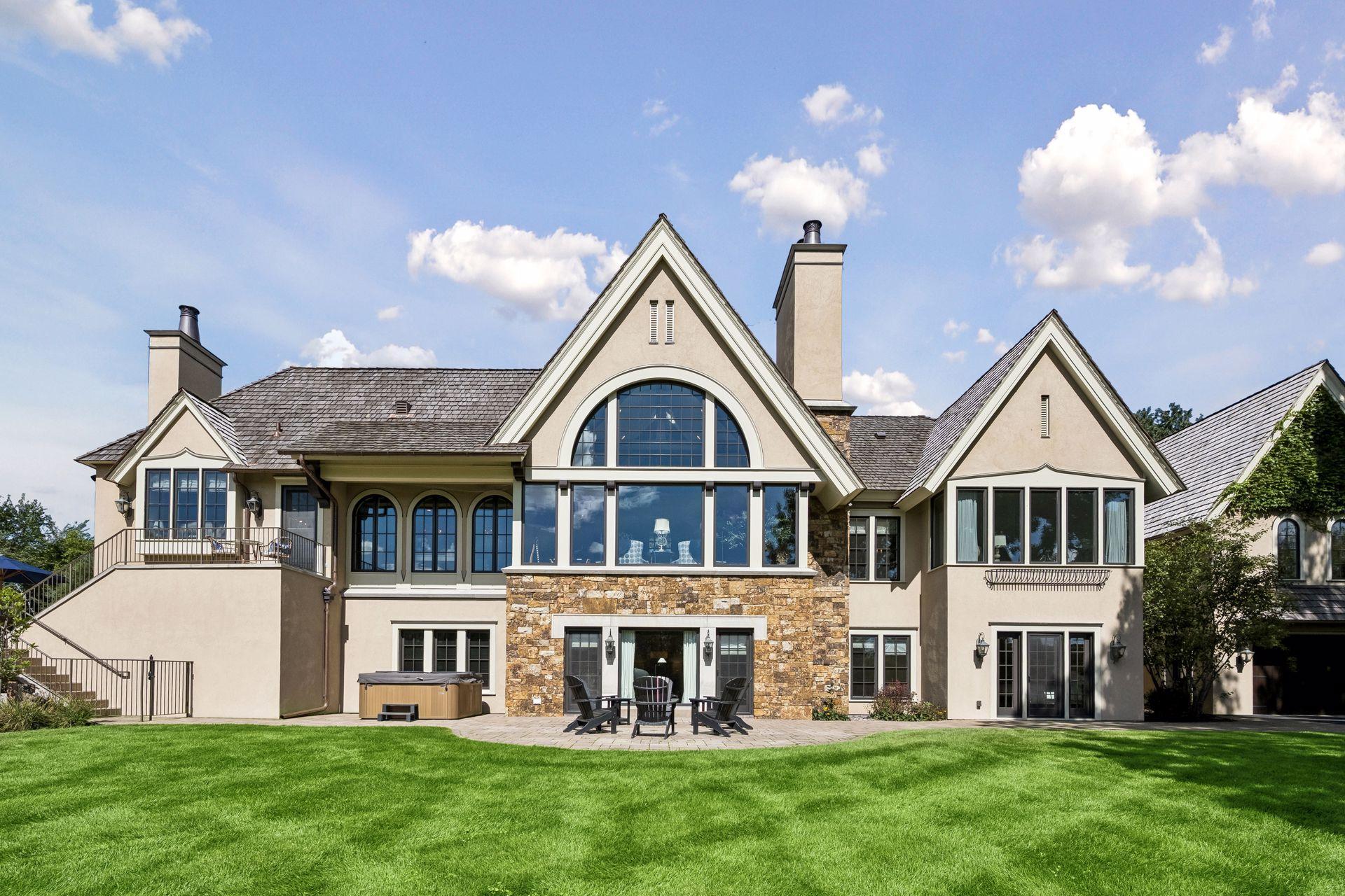 From afternoons by the pool to evenings in the hot tub, this outdoor retreat was designed to be enjoyed from day into night.