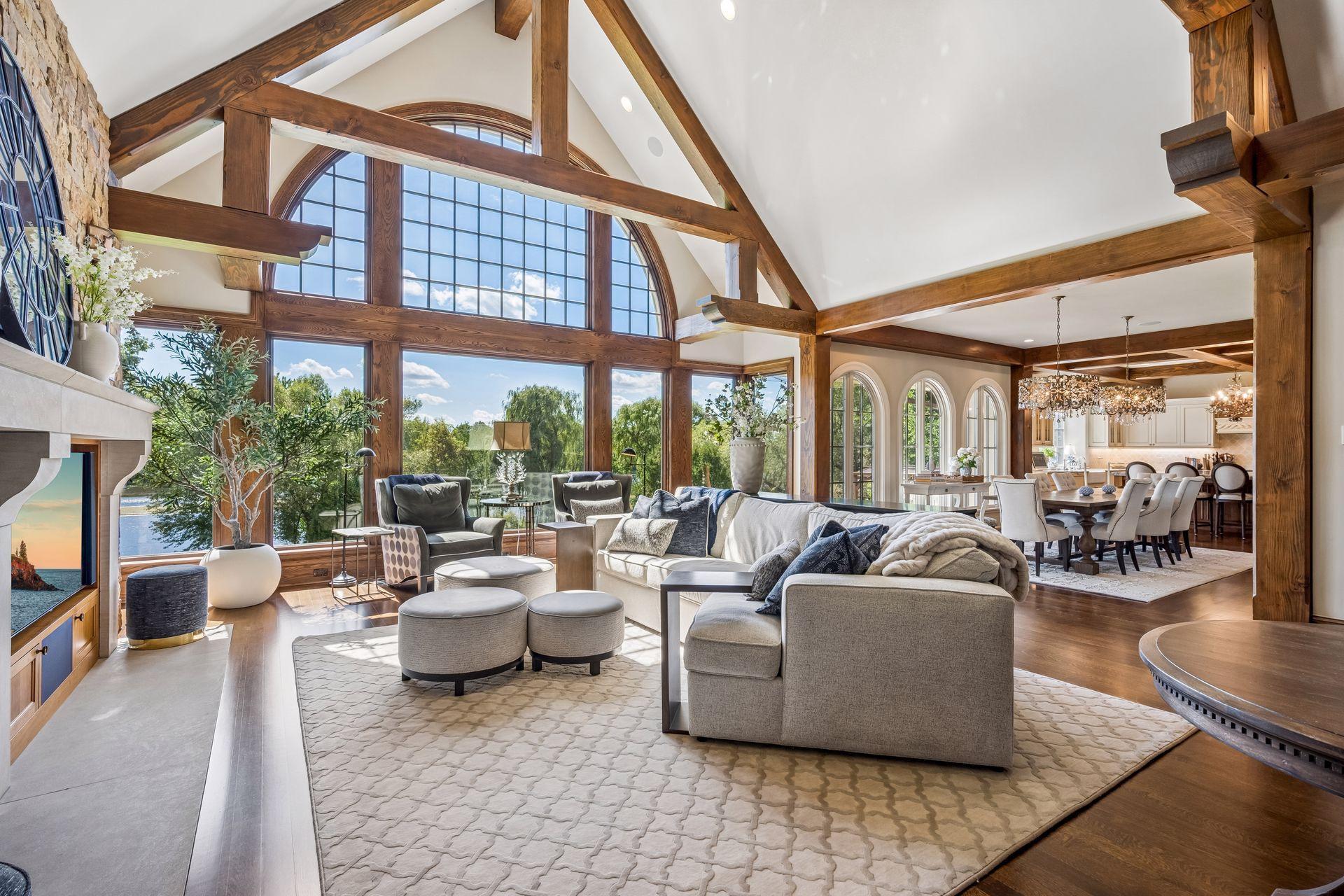 The linear floor plan captures views of the Mississippi from room after room.