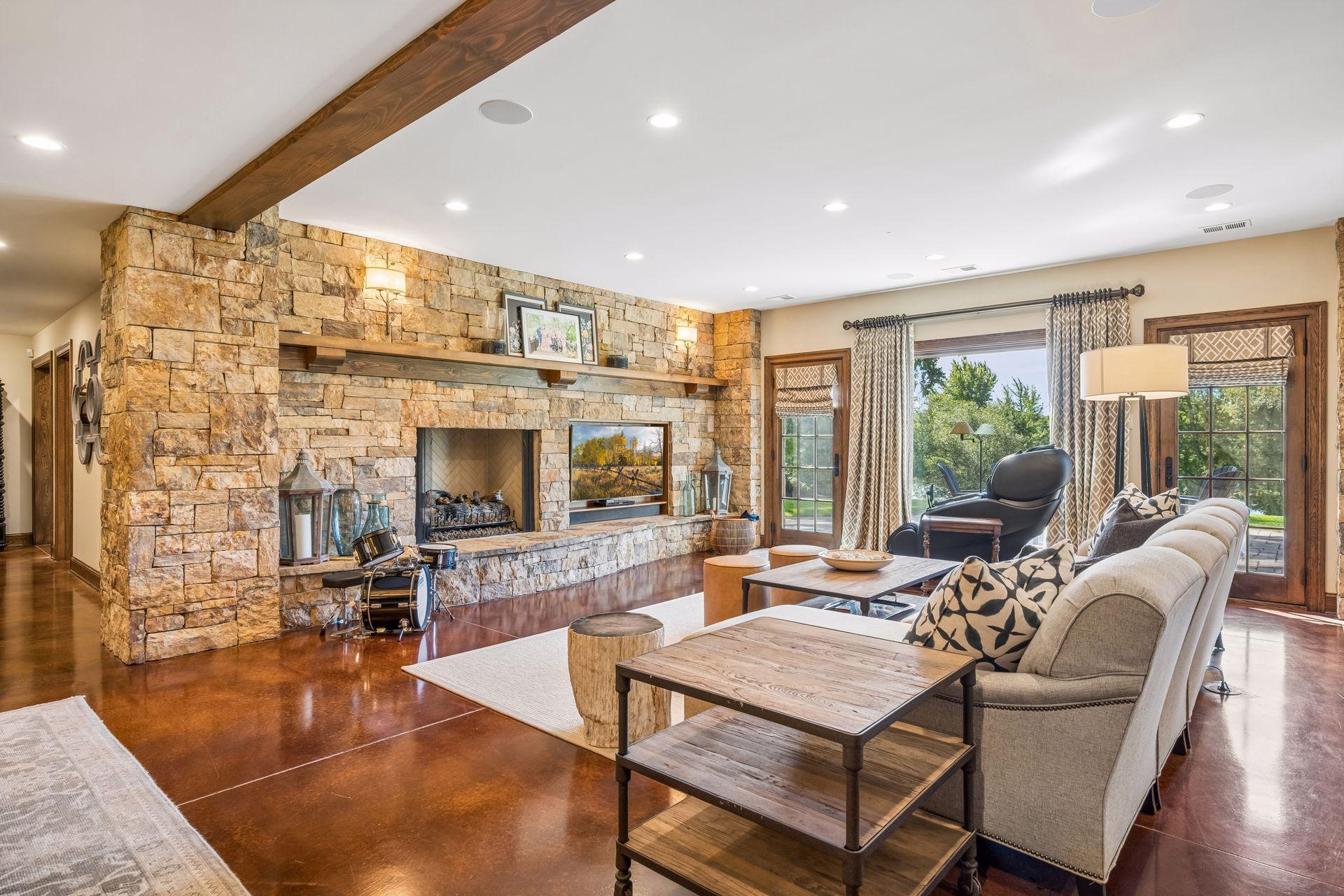 The lower level transitions seamlessly between entertaining, recreation, and guest accommodations.