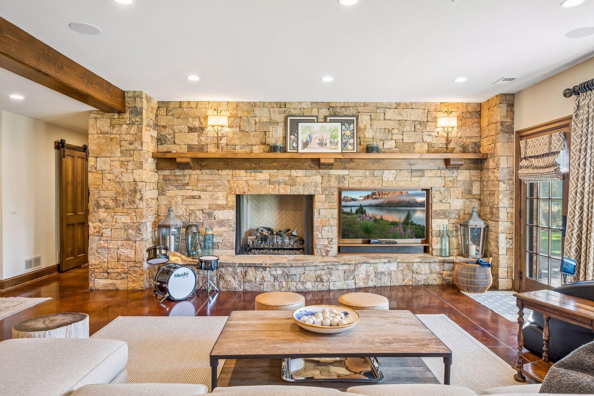 Another fireplace brings warmth and ambiance to the lower-level living space.