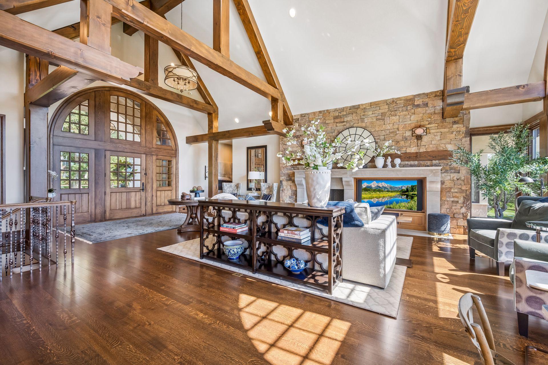 Natural light pours throughout the main level, creating an effortless connection to the outdoors.