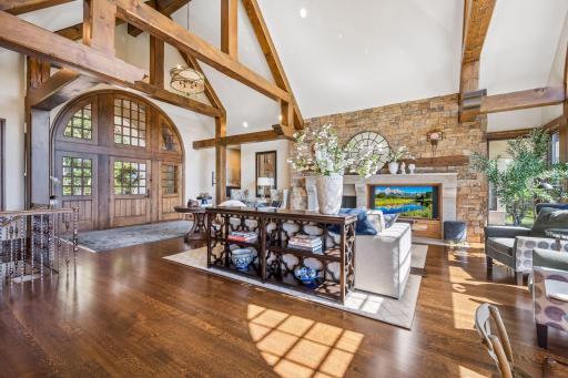 Natural light pours throughout the main level, creating an effortless connection to the outdoors.