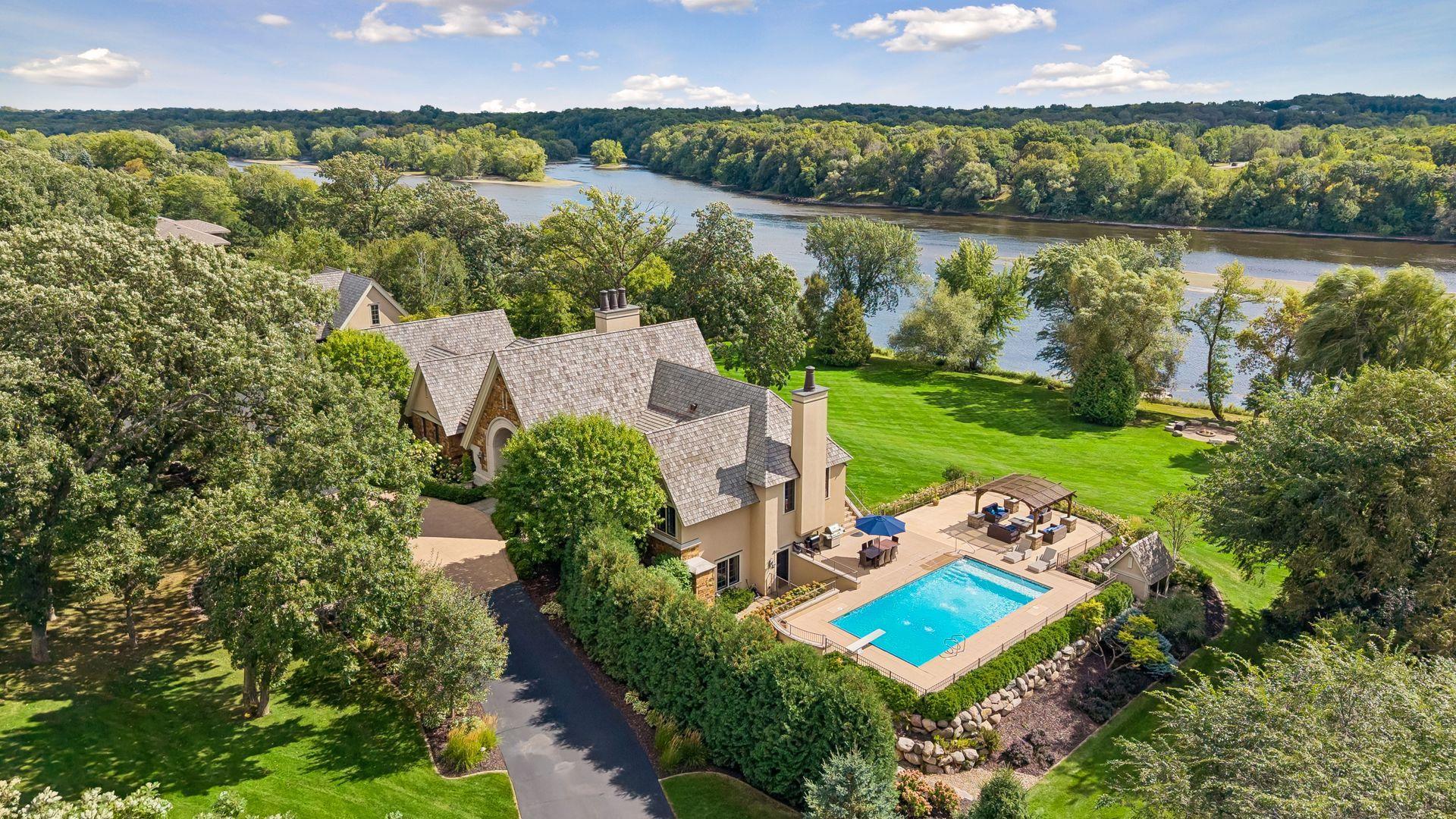A rare riverfront setting where breathtaking views are complemented by a gentle, gradual slope leading directly to the Mississippi River.