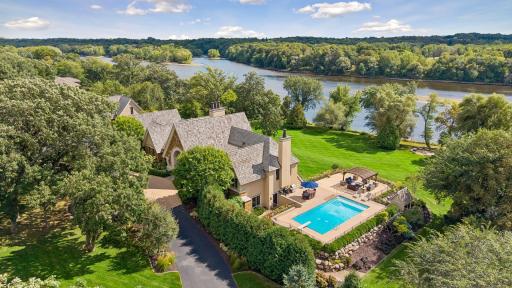 A rare riverfront setting where breathtaking views are complemented by a gentle, gradual slope leading directly to the Mississippi River.