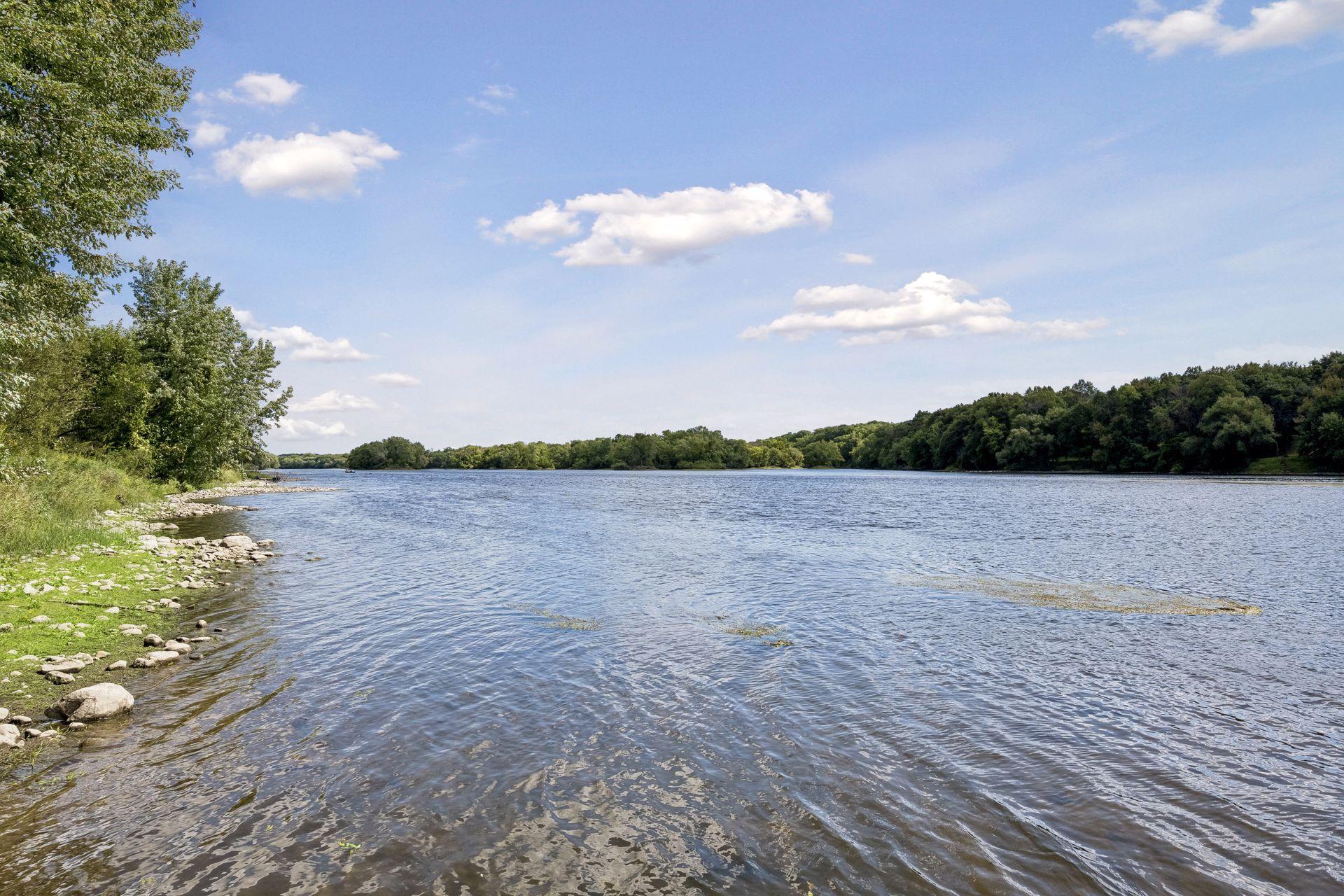 Cast a line just steps from home along a stretch of river known for exceptional smallmouth bass fishing.