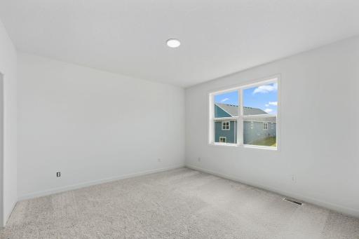 Made for rest and relaxation, the ownerâs suite features a luxe bathroom and a walk-in closet.