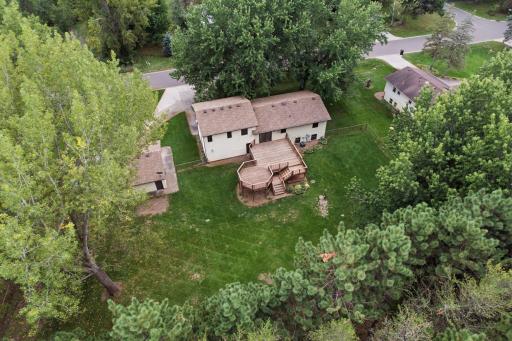 Fully fenced and tree lined offering a wonderfully private setting.