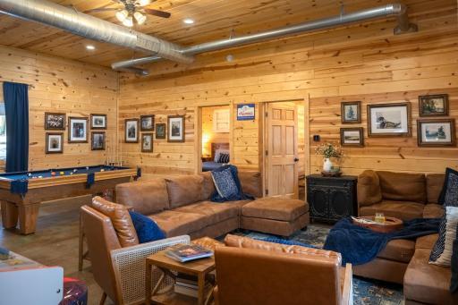 Living area w/pool table & arcade games