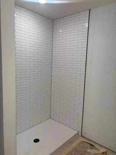Progress photo of beautiful tiled primary bath shower