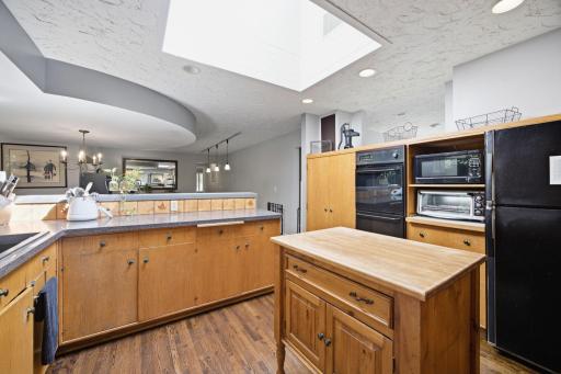 Stunning hardwood floors and unique ceiling architecture throughout the main level.