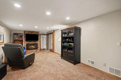 Lower level family room with gas fireplace