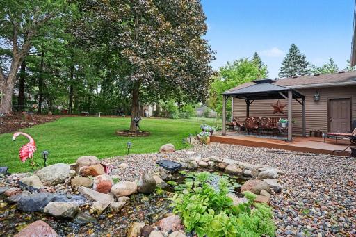 Backyard fully fenced oasis...Magnolia tree, red maple, lilac bushes all create the peaceful retreat.