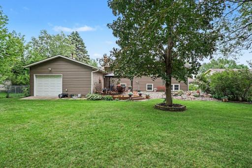 Four car garage door opens to backyard. Enjoy easy cleaning with epoxy garage floors and added storage with built-in cabinets. Both garages are plumbed, new copper gas lines and new garage door swings (04/2026)