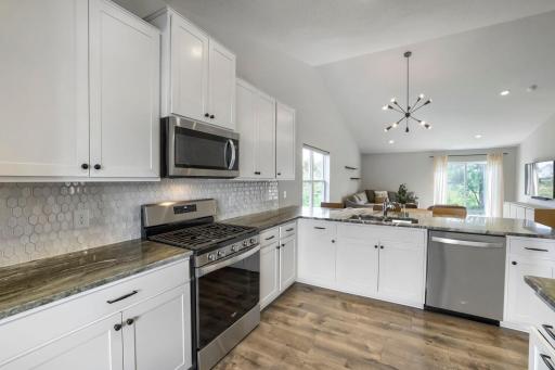 New Back Splash with SS Appliances and Granite Counter Tops