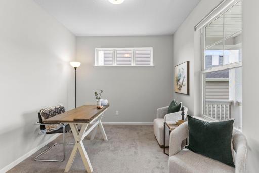 Office directly off the front of the home with extra transom window for ample light.