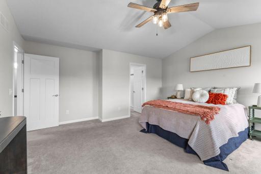 Another view of the generously sized primary suite, complete with private bath access and plenty of space to create your own relaxing retreat.