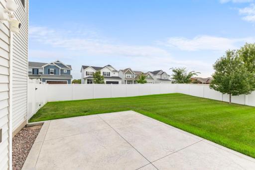Step outside to the large concrete patioâan ideal spot for grilling, outdoor dining, or relaxing while enjoying the backyard.