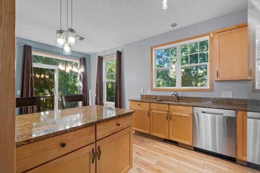 Flooring and baseboards were updated in 2023, with the microwave updated in 2022 and the range, refrigerator, and dishwasher updated in 2023.
