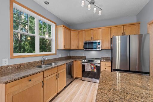 Granite countertops, plenty of cabinetry, stainless steel appliances.