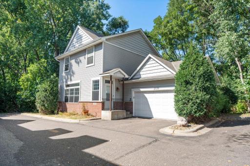 Plenty of parking for you and your guests! The attached two-car garage includes convenient shelving for additional storage, plus designated outdoor guest parking spaces for easy entertaining.