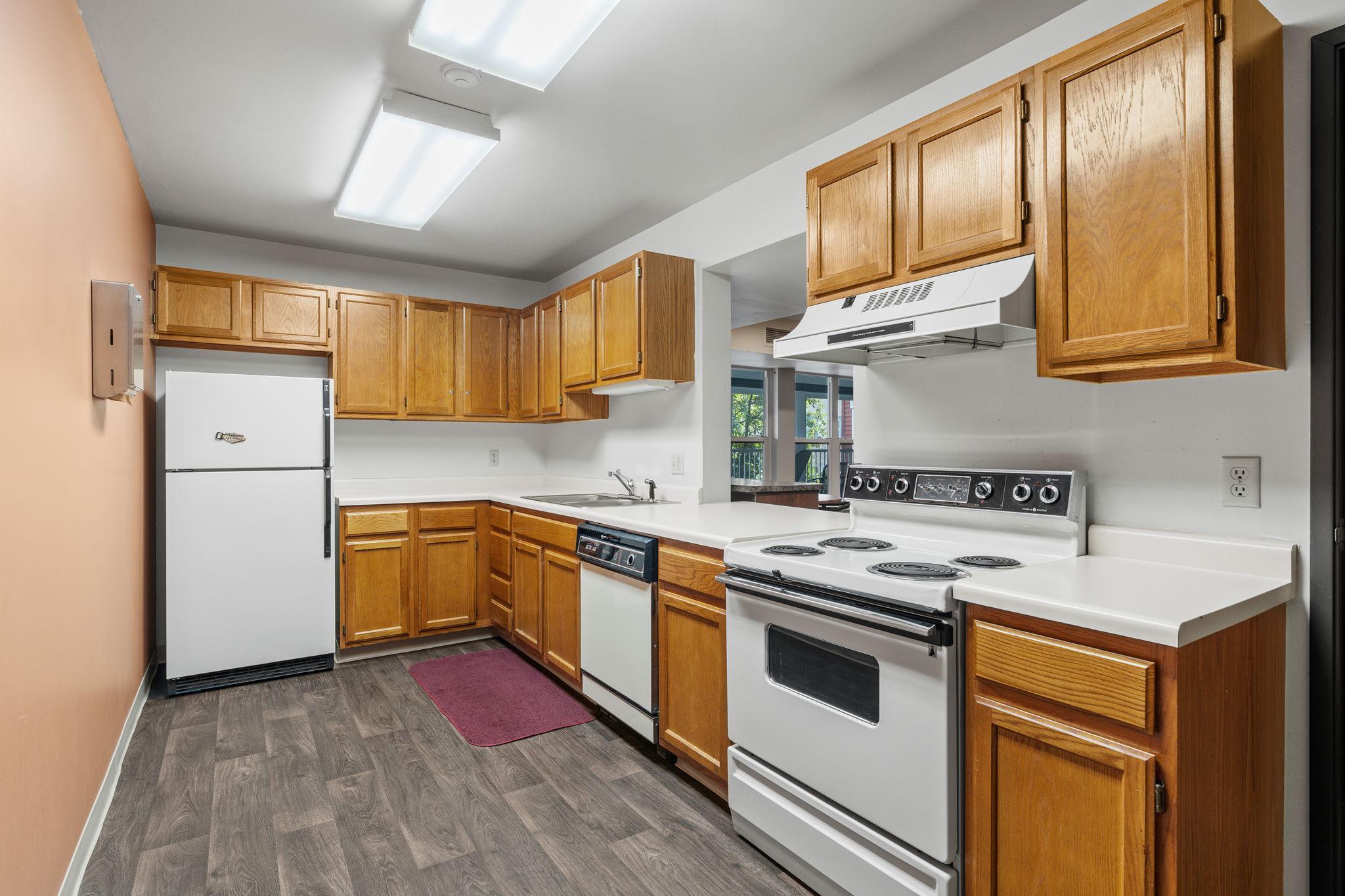 Enjoy the convenience of a spacious common kitchen area, perfect for hosting and entertaining