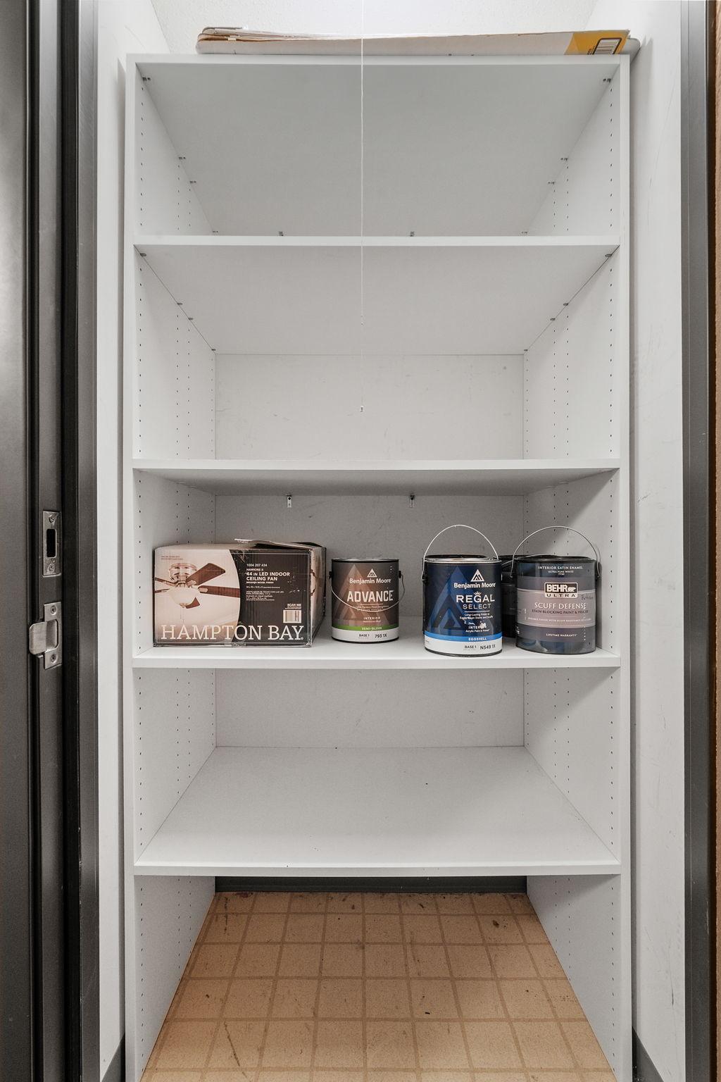 Convenient kitchen pantry provides additional storage and organization