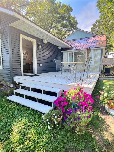 Lake side deck, a bright sunny area for enjoying lake views and sunrises for the morning person of the house.