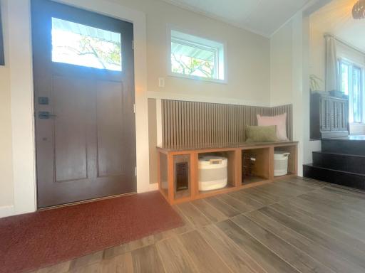 The sitting room offers a pleasant view and features a hatch leading to the crawl space. All the utilities, all of which are new since the remodel are located in the crawl space.