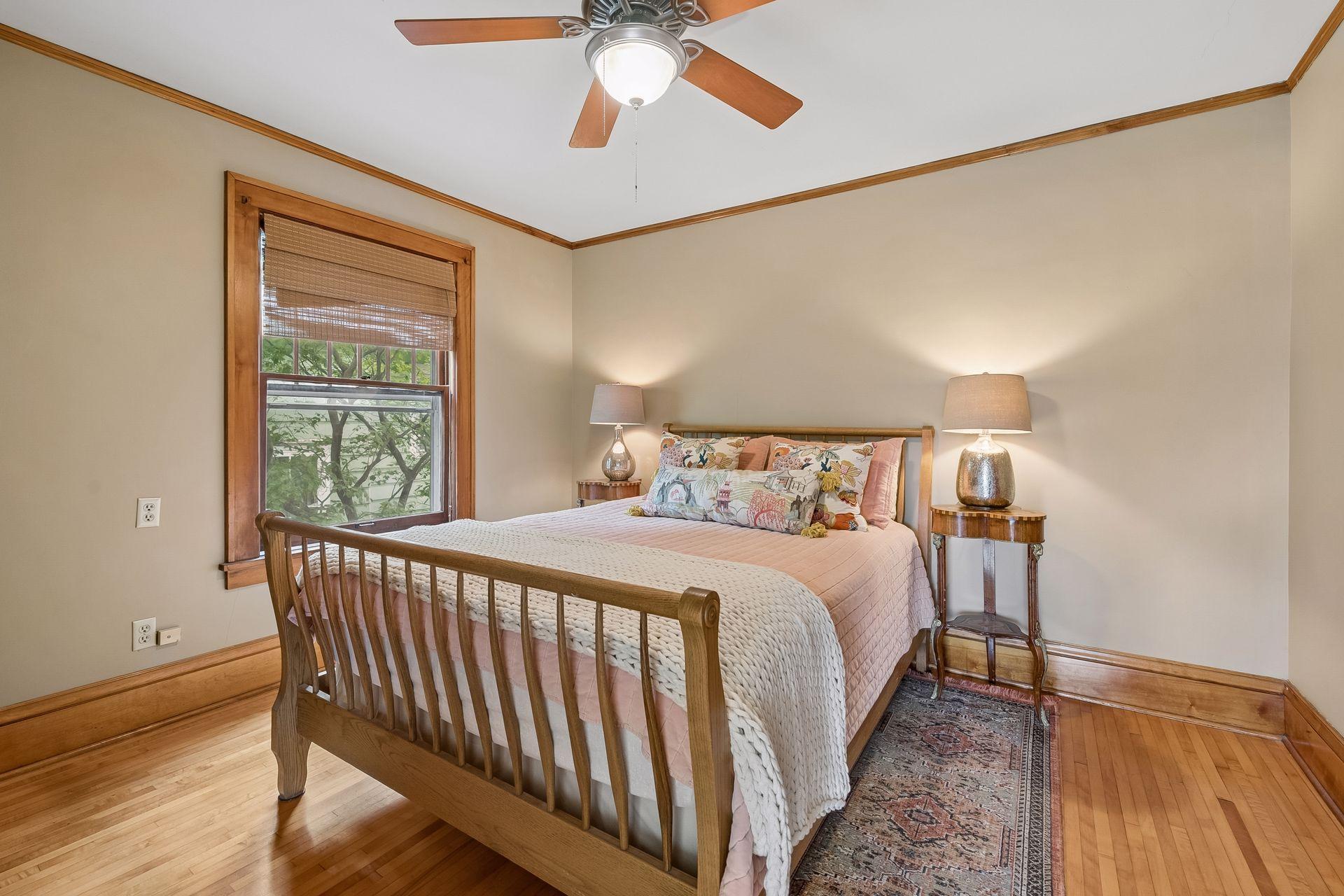 The primary bedroom includes a generous sitting room overlooking the backyard.