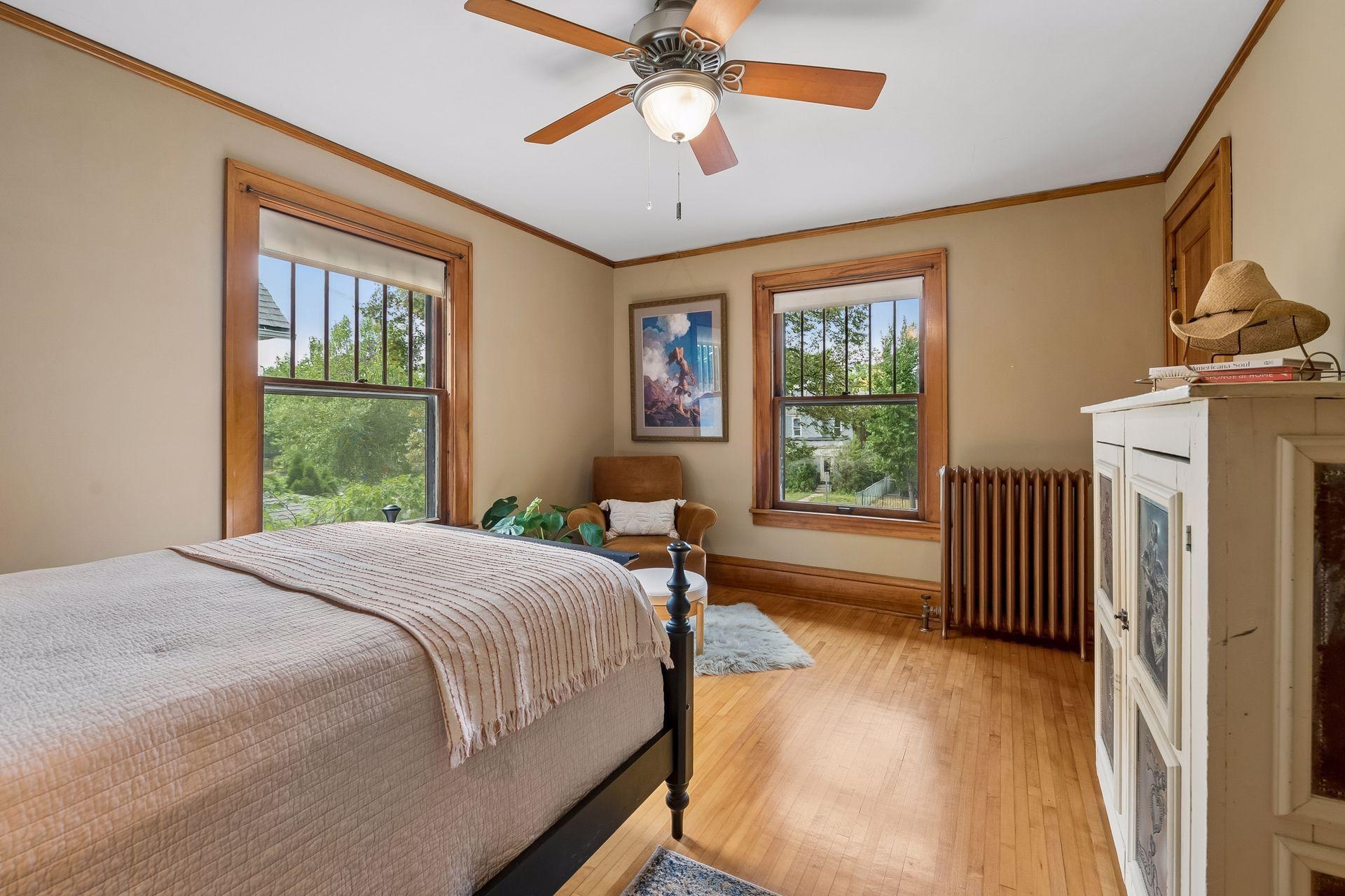 Original woodwork and hardwood floors continue throughout the second floor.