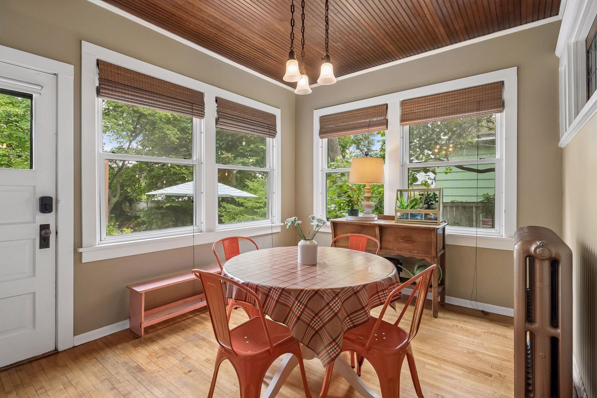 A house of many porches including this year-round back porch overlooking the gardens.