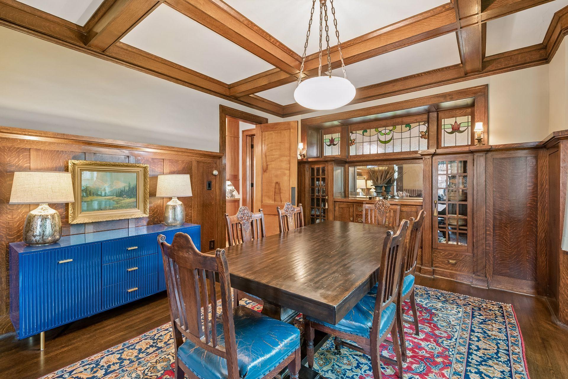 Stained glass originally from England adds a distinctive touch to the dining room.