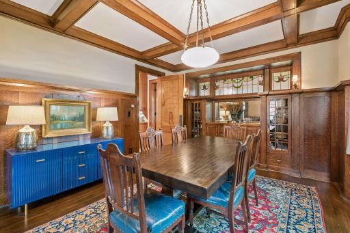Stained glass originally from England adds a distinctive touch to the dining room.