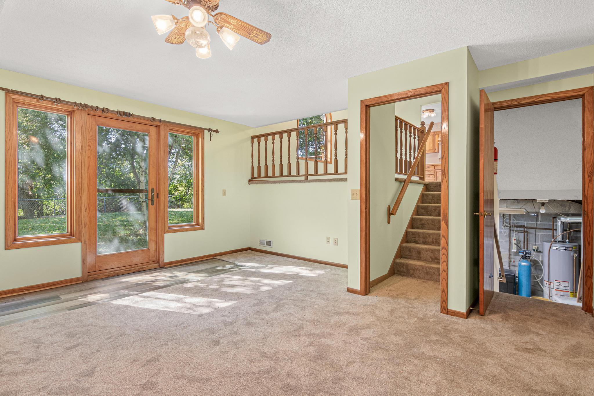 Lower Level Living Area opens to Fenced Backyard