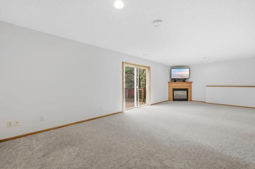 The lower level family room walks out to the lower deck!