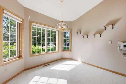 This eat-in area features a bay window that brings in plenty of natural light!