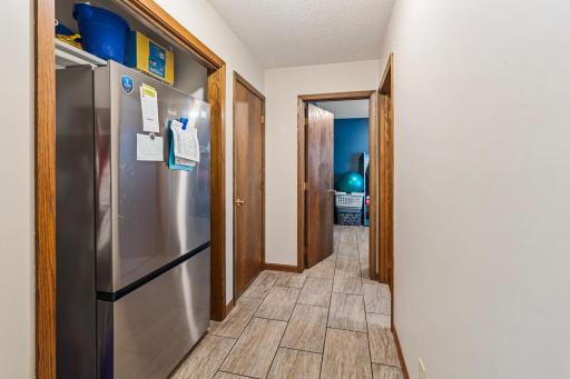 Hallway off garage for bonus fridge