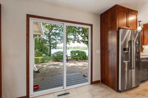 Patio doors to river side of home