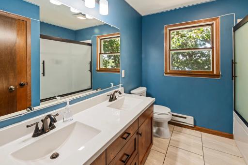 Upper level full bathroom off hall
