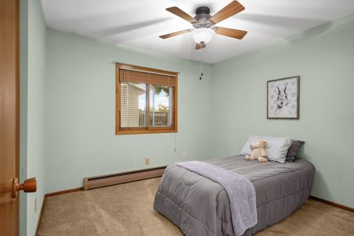 Another nicely sized bedroom that could also work well as a home office or hobby space.