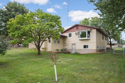 Nice-sized fenced backyard with mature trees and plenty of room to enjoy the outdoors.