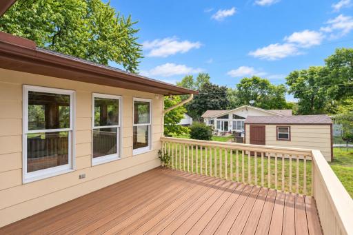 Enjoy outdoor dining, grilling or relaxing with easy access from the Sunroom.