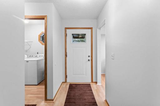 Beautiful floorings spans the main level! Welcome home! Stylish, modern front door!