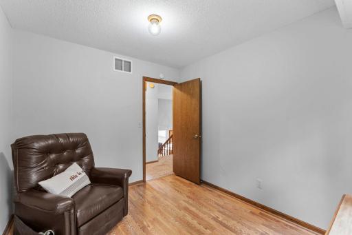Beautiful mix of neutral colors, and natural woodwork work and floors.