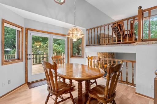 Informal dining walks out to private deck space.